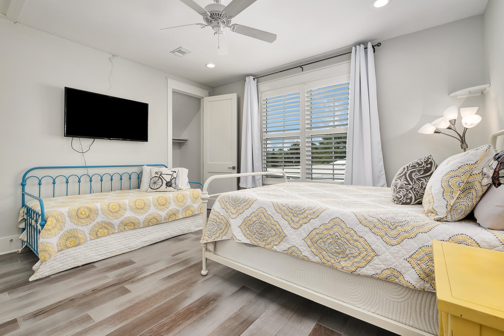 126 Crescent Road Santa Rosa Beach, FL 32459 - Photo 32 of 46 a bedroom with a large bed and a flat screen tv