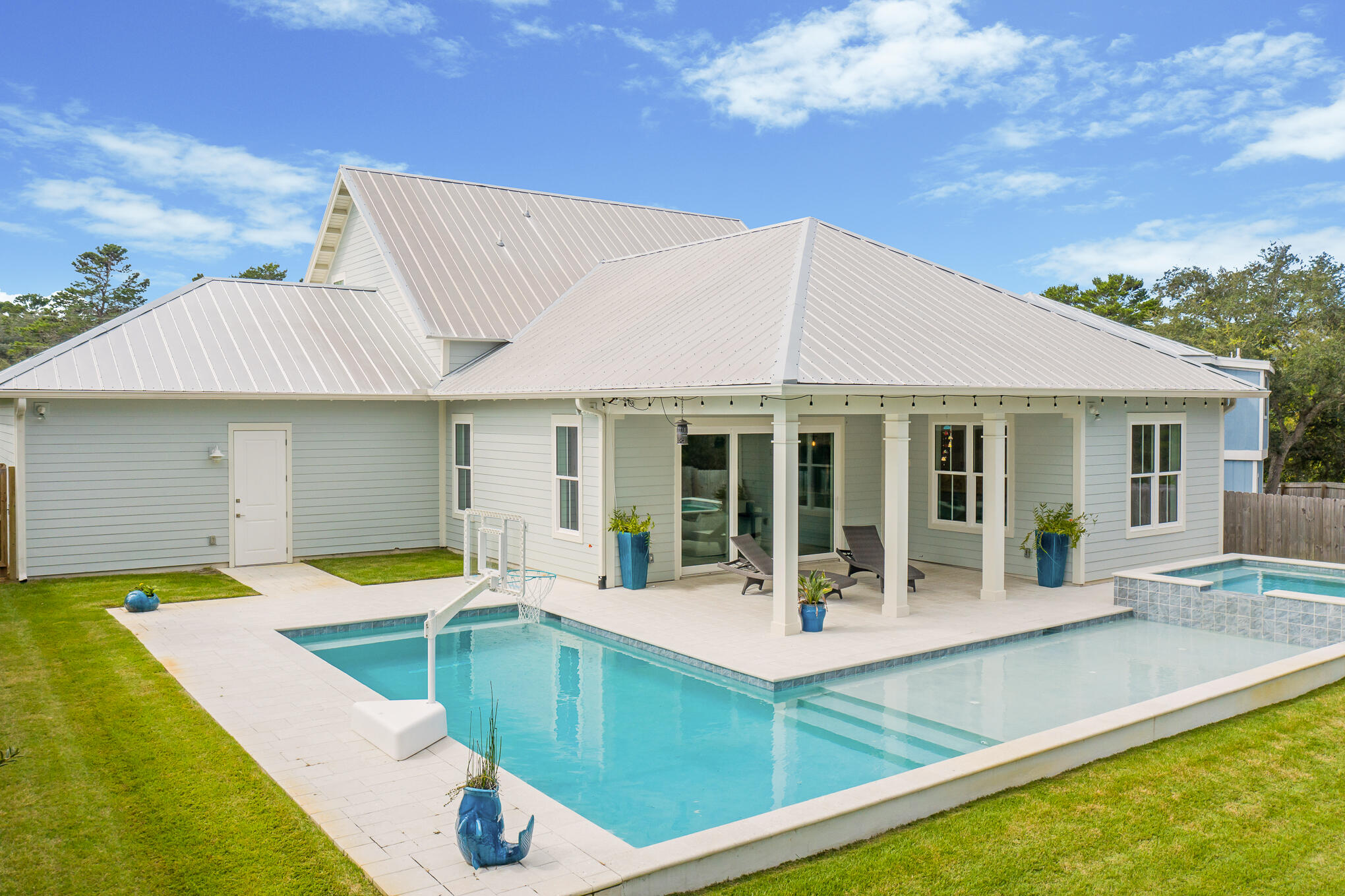 126 Crescent Road Santa Rosa Beach, FL 32459 - Photo 38 of 46 a view of a house with swimming pool and sitting area