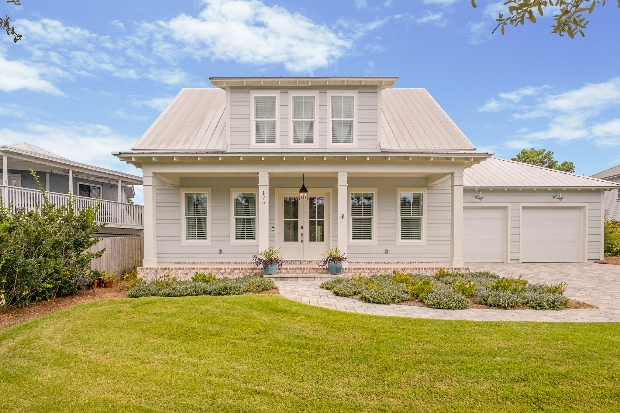 126 Crescent Road Santa Rosa Beach, FL 32459 - Photo 5 of 46 a front view of a house with a yard