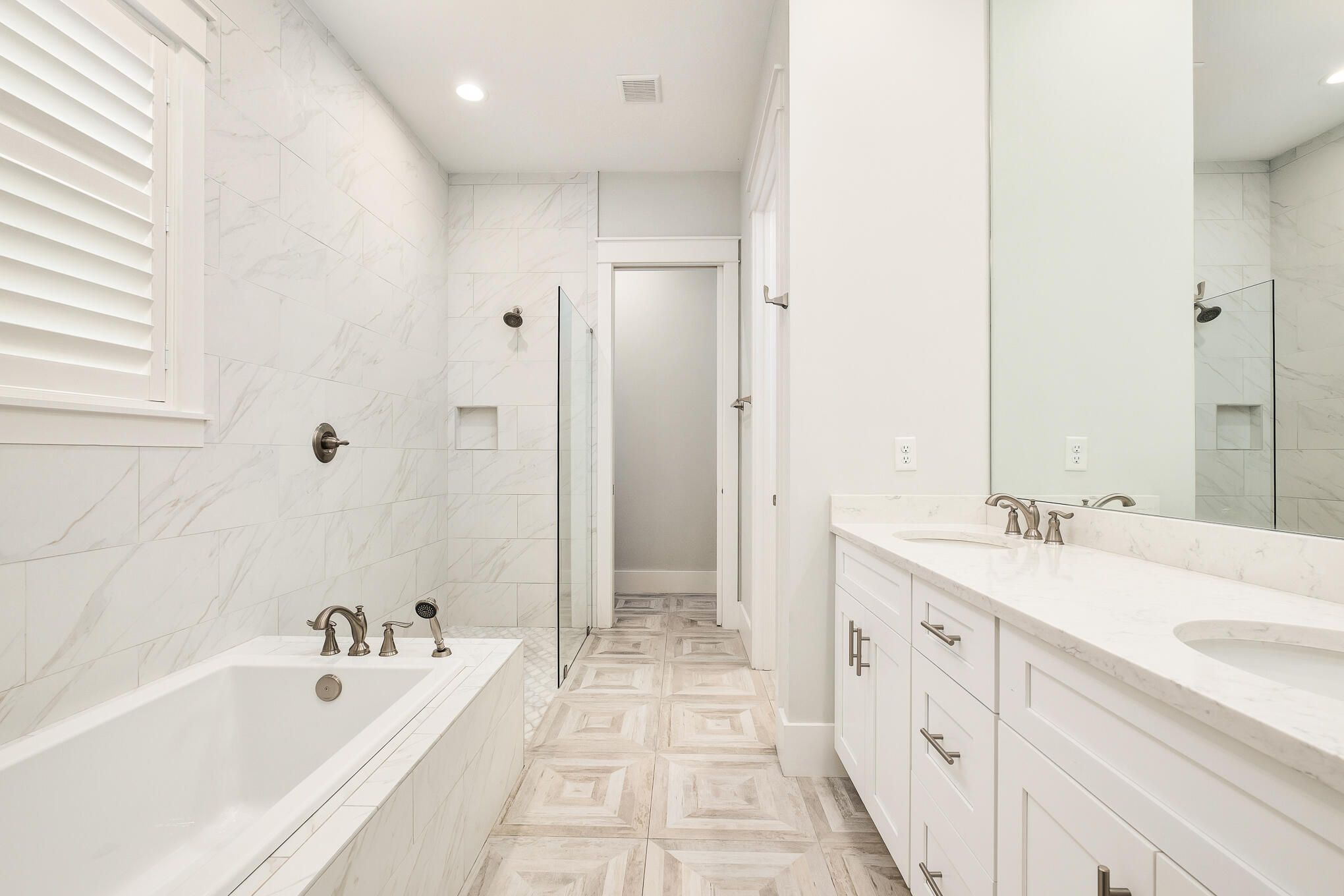 126 Crescent Road Santa Rosa Beach, FL 32459 - Photo 10 of 46 a spacious bathroom with a tub sink double vanity and mirror