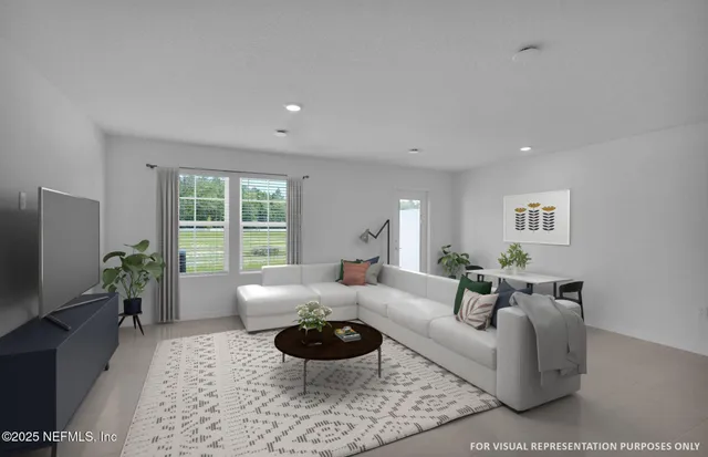 a living room with furniture a flat screen tv and a large window