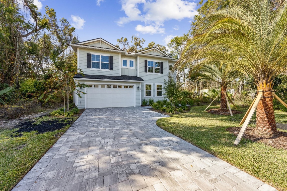 649 South 7th Street Fernandina Beach, FL 32034 - Photo 2 of 35 a front view of a house with a yard