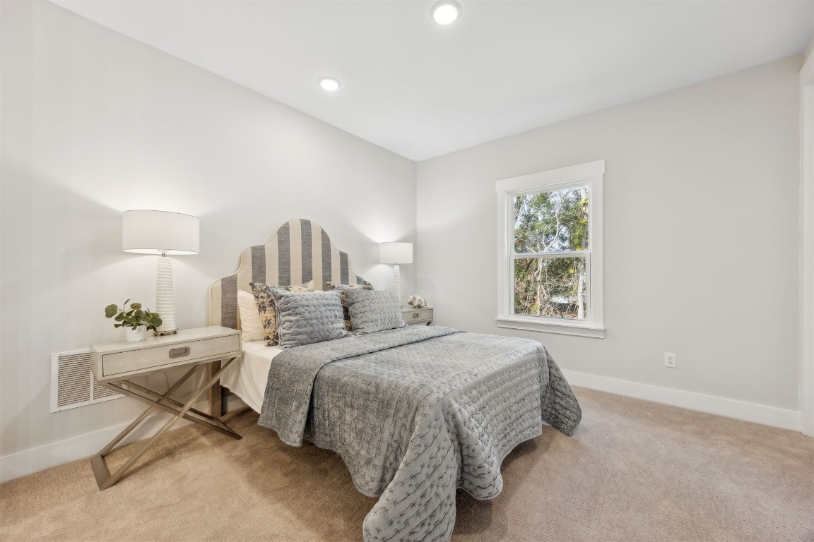 649 South 7th Street Fernandina Beach, FL 32034 - Photo 22 of 35 a bed room with a bed and a window