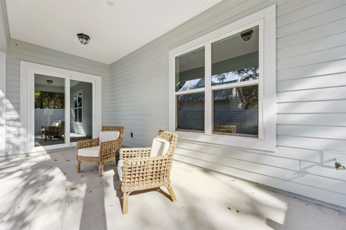 649 South 7th Street Fernandina Beach, FL 32034 - Photo 35 of 35 a view of a house with backyard and porch