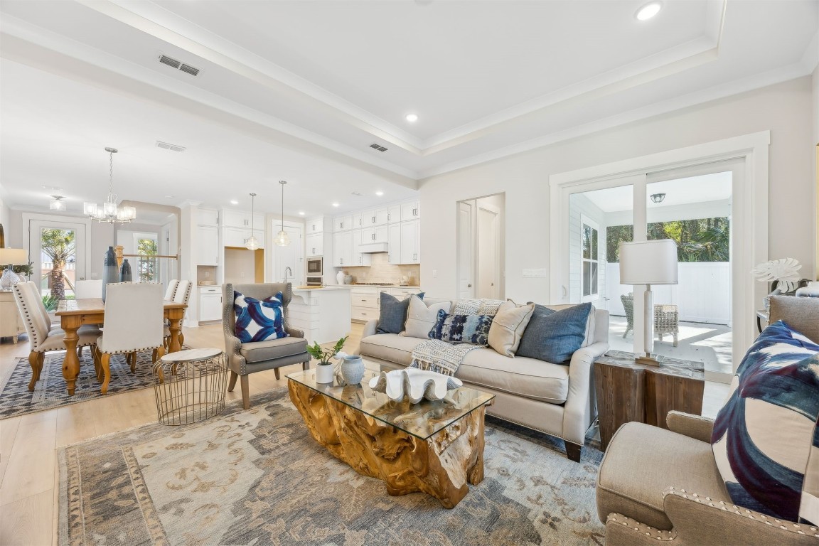 649 South 7th Street Fernandina Beach, FL 32034 - Photo 10 of 35 a living room with furniture kitchen and a table
