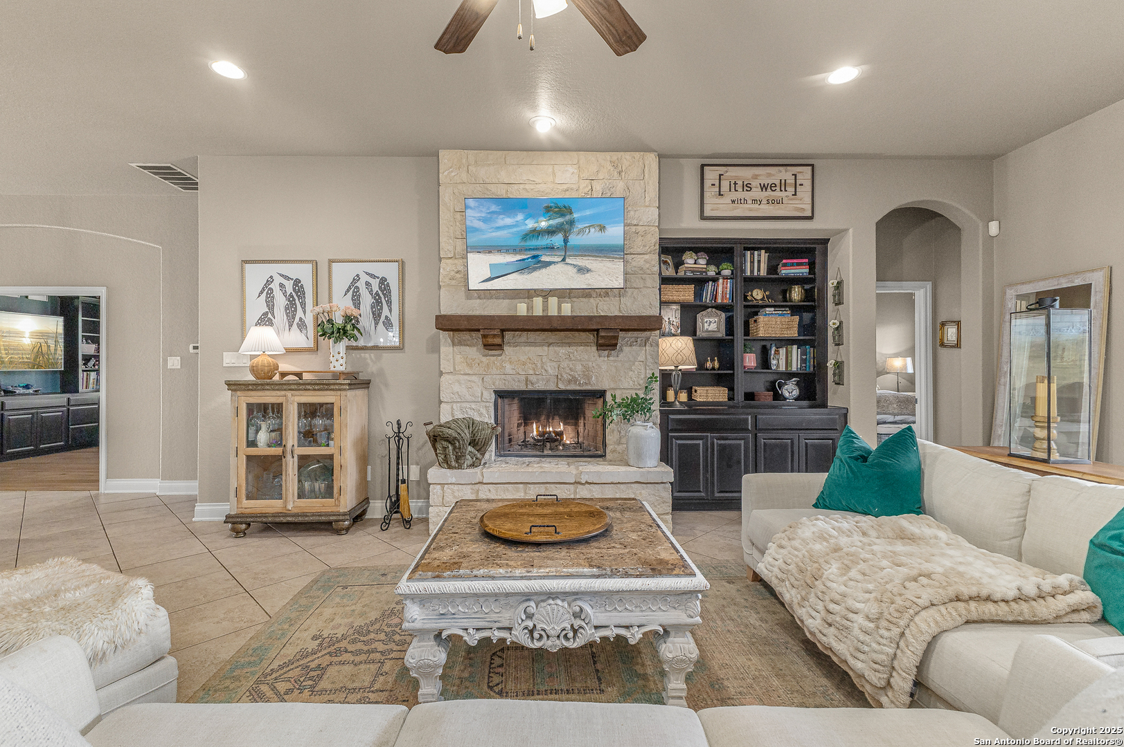 28938 Fairs Gate Fair Oaks Ranch, TX 78015 - Photo 11 of 41 a living room with furniture and a fireplace