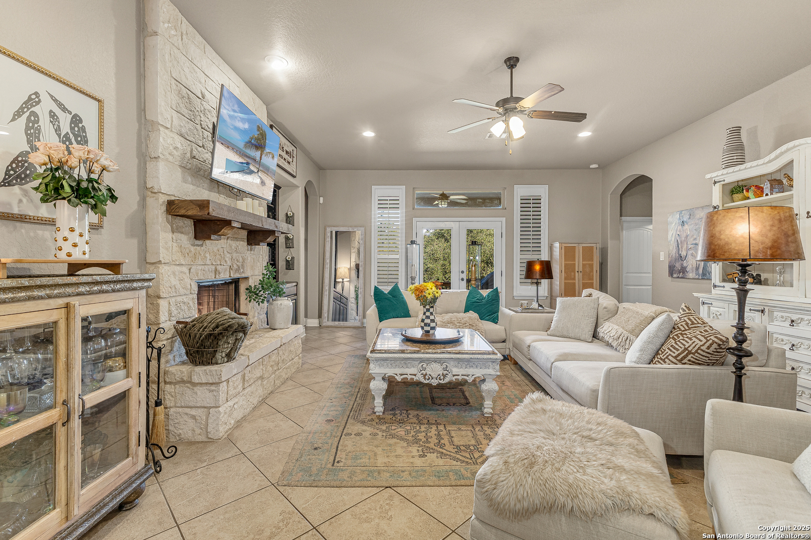 28938 Fairs Gate Fair Oaks Ranch, TX 78015 - Photo 12 of 41 a living room with furniture and a flat screen tv