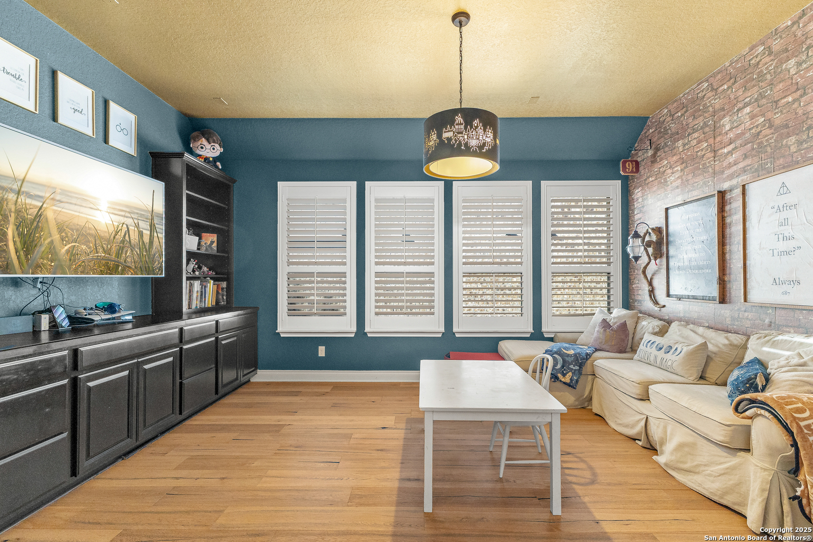 28938 Fairs Gate Fair Oaks Ranch, TX 78015 - Photo 15 of 41 a kitchen with a chandelier and living room