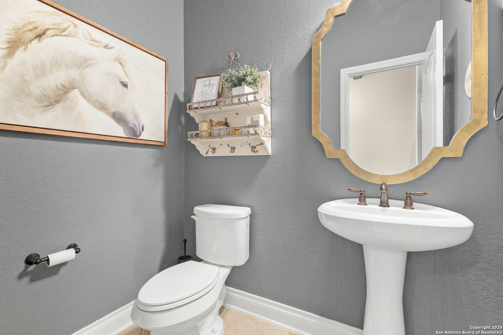 28938 Fairs Gate Fair Oaks Ranch, TX 78015 - Photo 19 of 41 a bathroom with a toilet sink and mirror