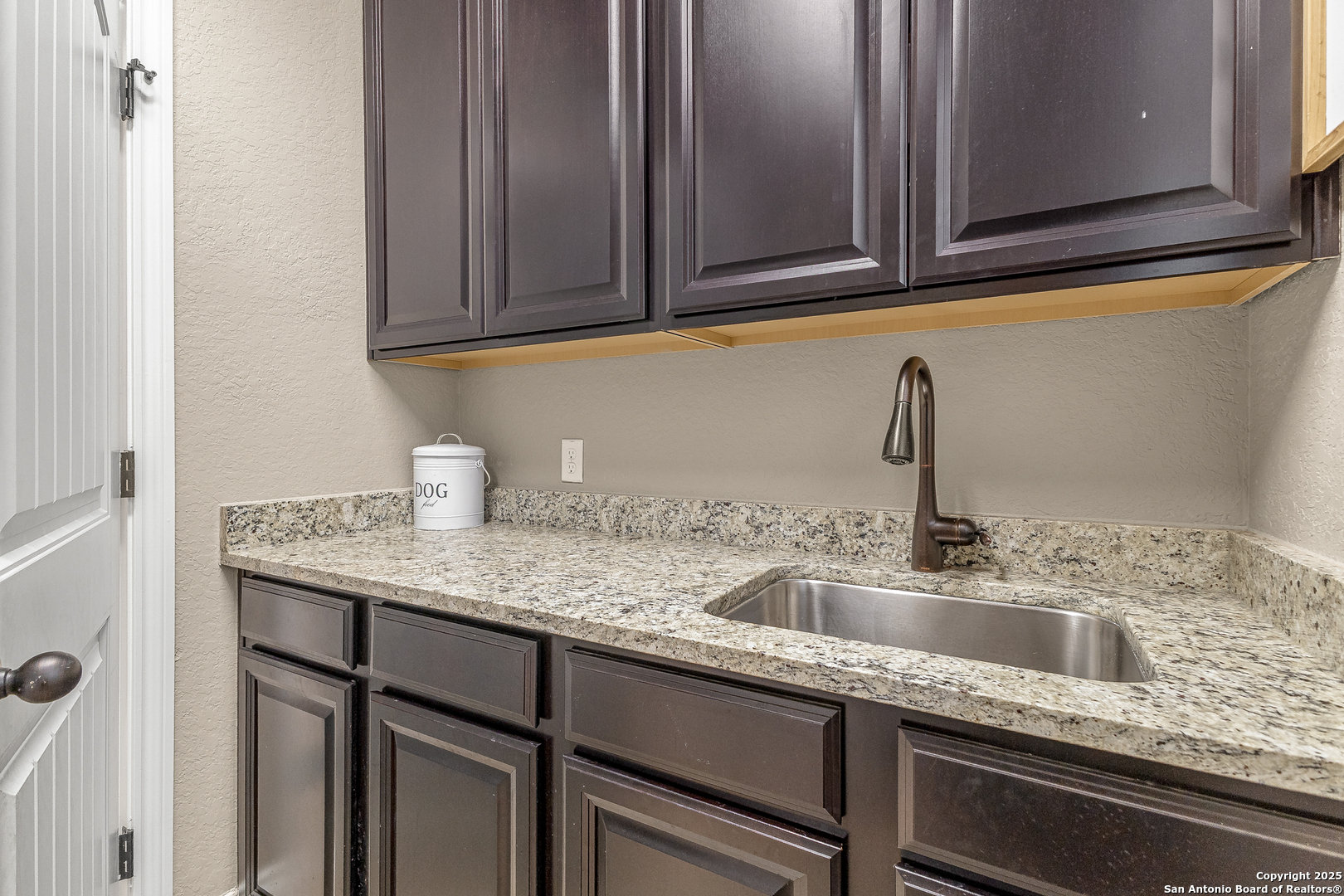 28938 Fairs Gate Fair Oaks Ranch, TX 78015 - Photo 20 of 41 a kitchen with granite countertop a sink and cabinets