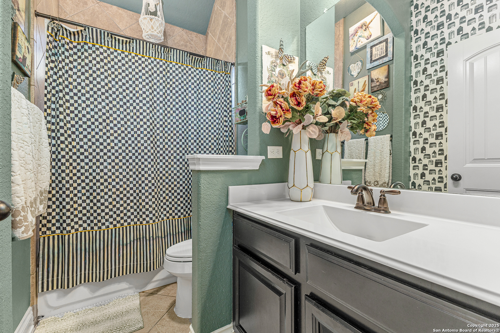 28938 Fairs Gate Fair Oaks Ranch, TX 78015 - Photo 23 of 41 a bathroom with a sink a toilet and mirror