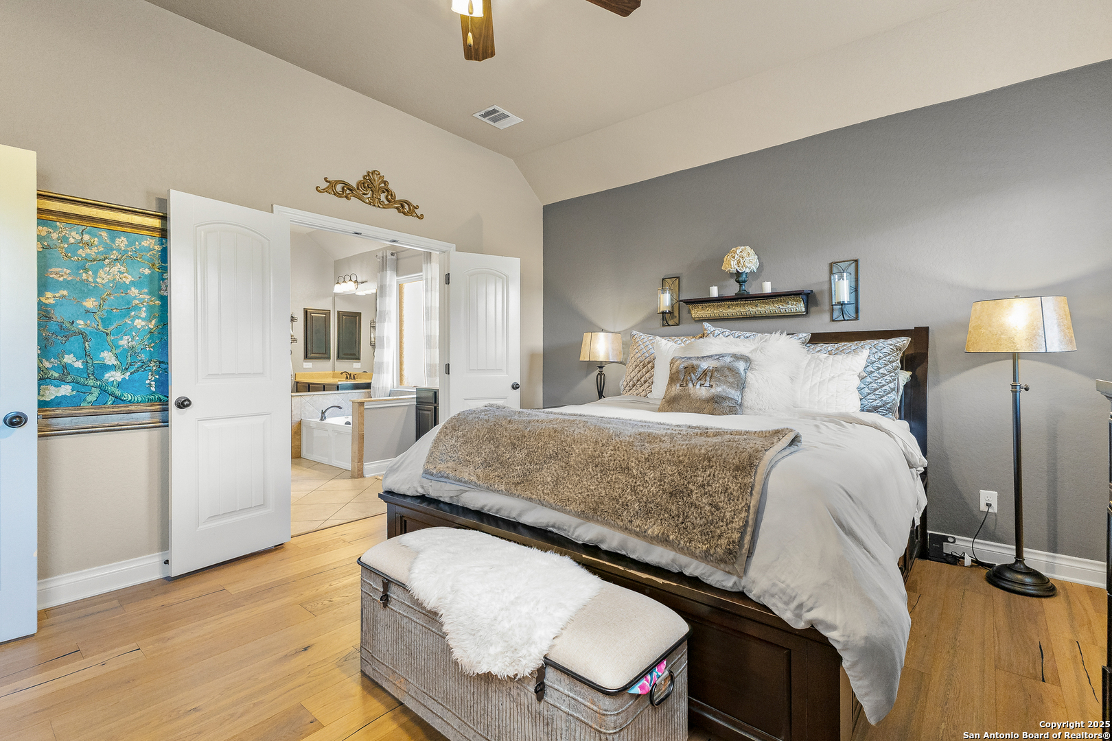 28938 Fairs Gate Fair Oaks Ranch, TX 78015 - Photo 26 of 41 a bedroom with a bed and wooden floor