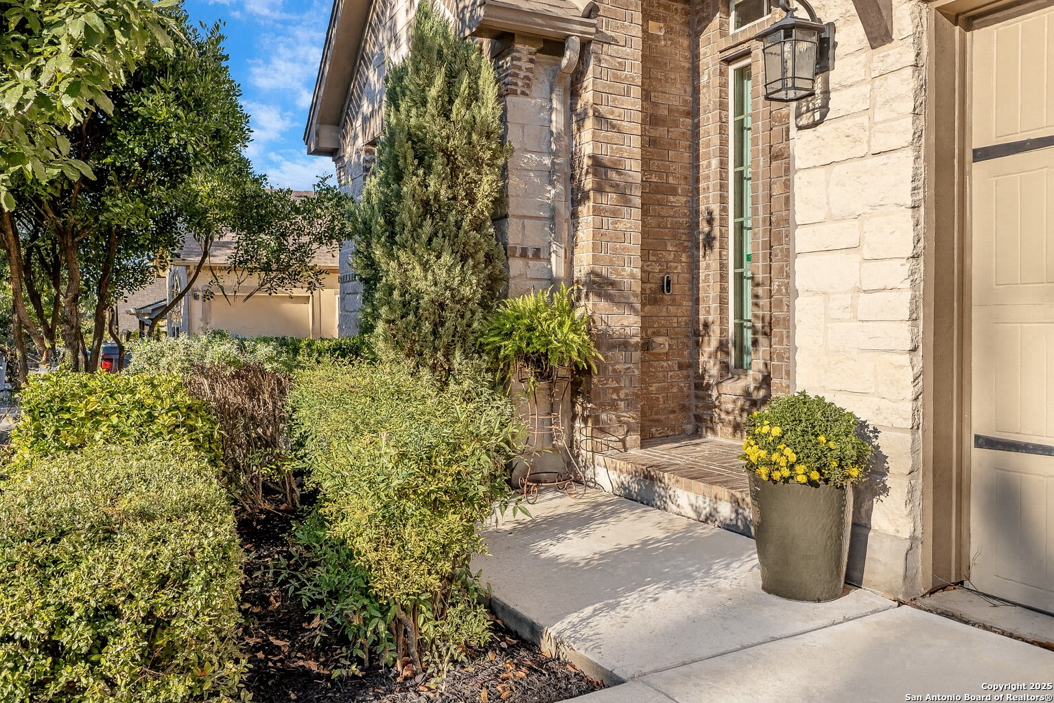 28938 Fairs Gate Fair Oaks Ranch, TX 78015 - Photo 3 of 41 a view of a fountain with potted plants