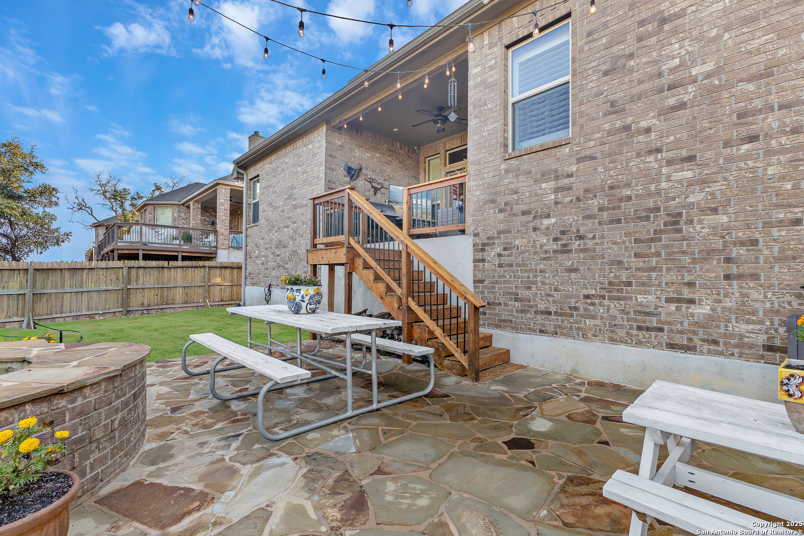 28938 Fairs Gate Fair Oaks Ranch, TX 78015 - Photo 32 of 41 a view of a chairs and table in patio with a backyard