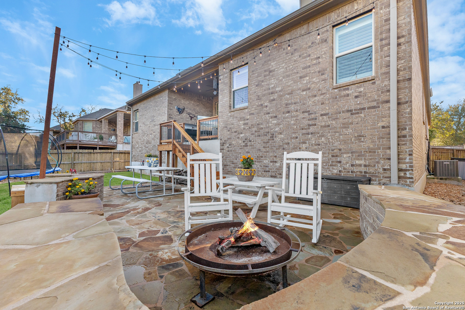 28938 Fairs Gate Fair Oaks Ranch, TX 78015 - Photo 33 of 41 a view of a patio with couches chairs and a table