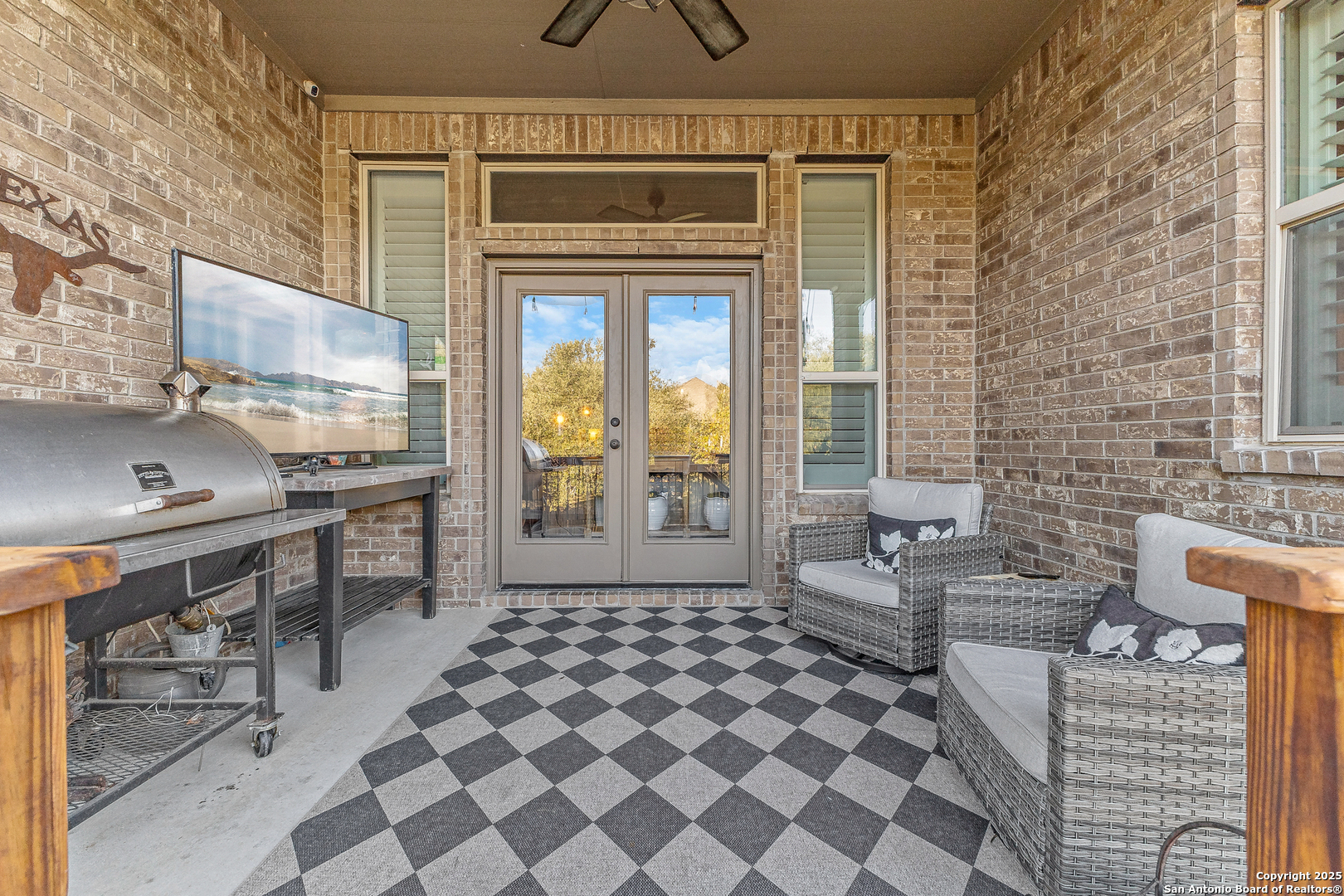 28938 Fairs Gate Fair Oaks Ranch, TX 78015 - Photo 39 of 41 a living room with furniture and a floor to ceiling window
