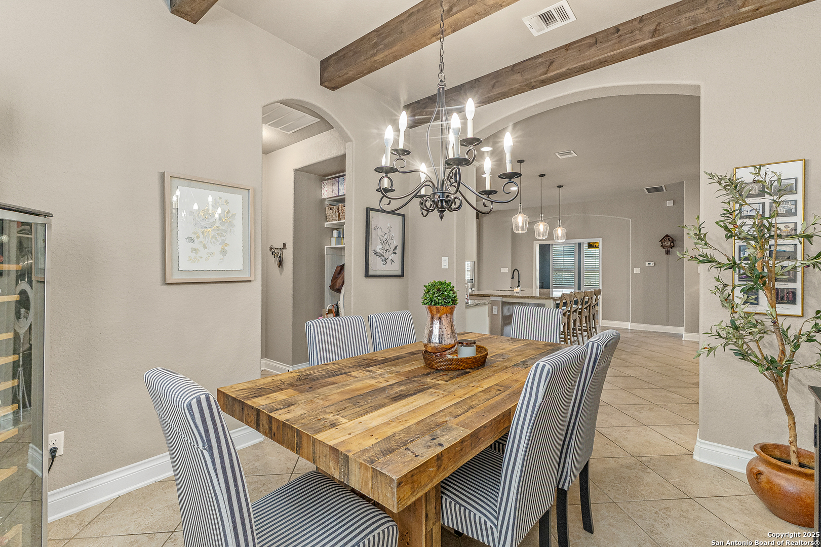 28938 Fairs Gate Fair Oaks Ranch, TX 78015 - Photo 10 of 41 a view of a dining room with furniture and chandelier