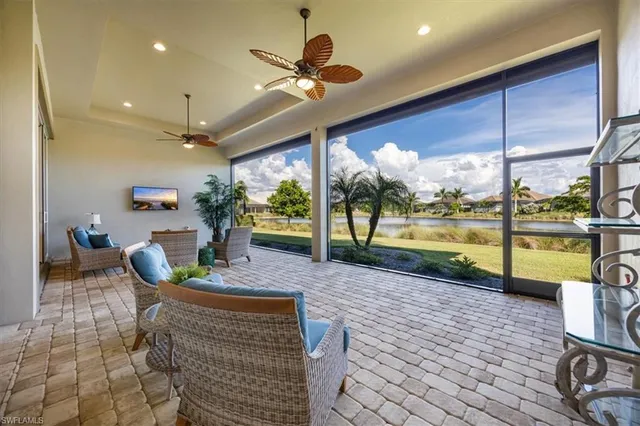 a view of swimming pool with a patio