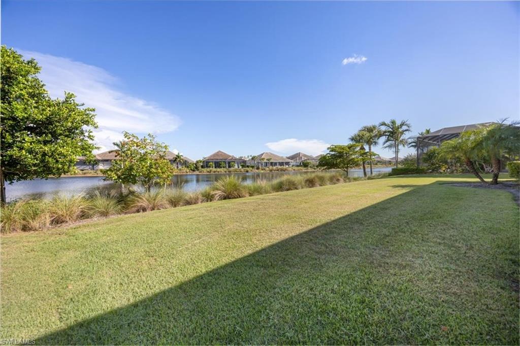 6152 Rodney Bay Lane Naples, FL 34113 - Photo 30 of 45 a view of a field with an ocean