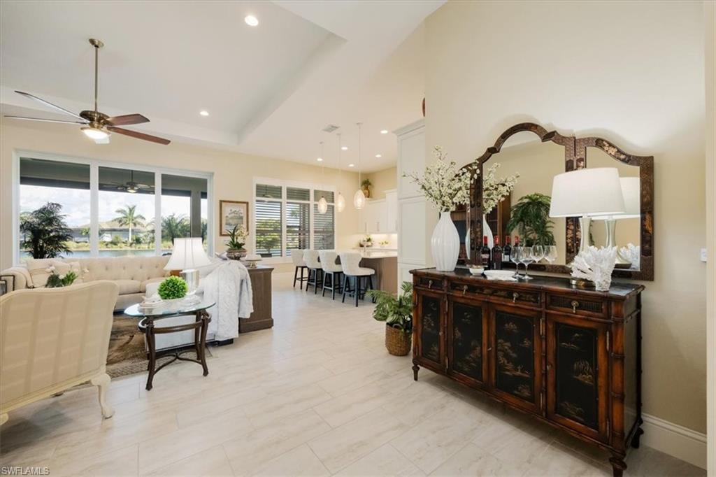 6152 Rodney Bay Lane Naples, FL 34113 - Photo 10 of 45 a living room with furniture