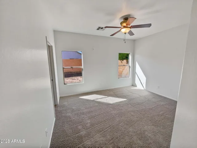 a view of a hallway with front door