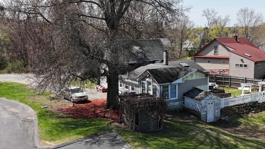 122 Pleasant Valley Street Methuen, MA 01844 - Photo 16 of 27 a front view of a house with garden