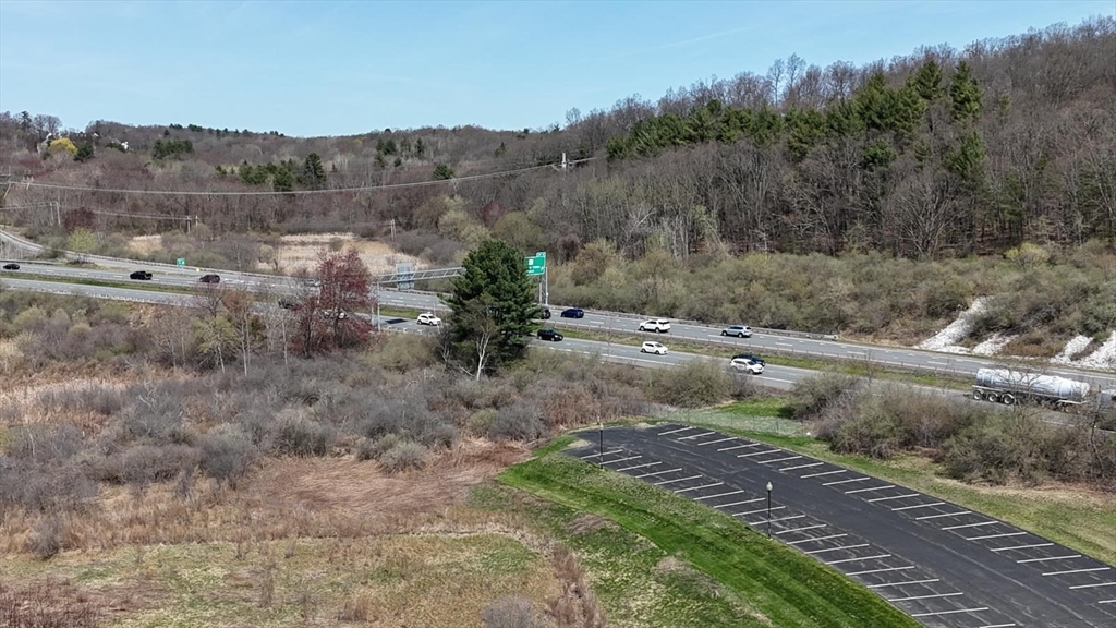 122 Pleasant Valley Street Methuen, MA 01844 - Photo 21 of 27 a view of a yard with a tree