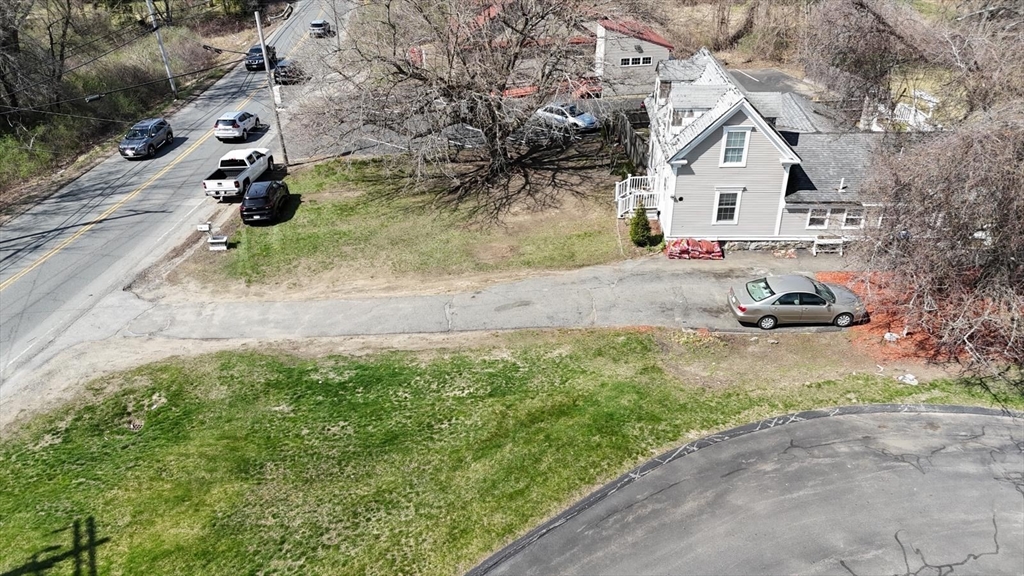 122 Pleasant Valley Street Methuen, MA 01844 - Photo 23 of 27 an aerial view of a house with a yard