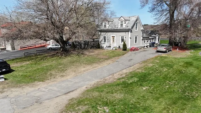 a view of street with parked cars