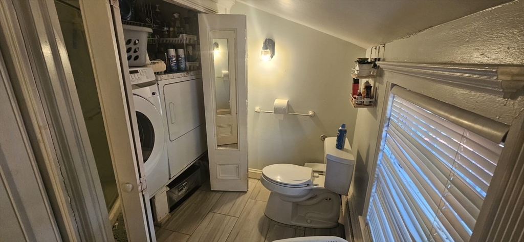 122 Pleasant Valley Street Methuen, MA 01844 - Photo 10 of 27 a bathroom with a sink and toilet