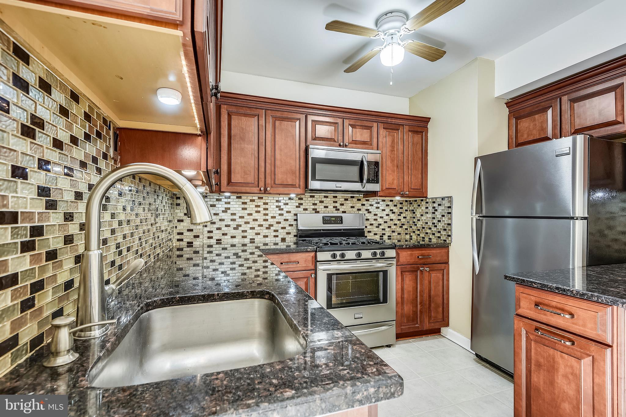 1413 Decatur Street Baltimore, MD 21230 - Photo 7 of 31 Updated Kitchen with SS appliances and granite
