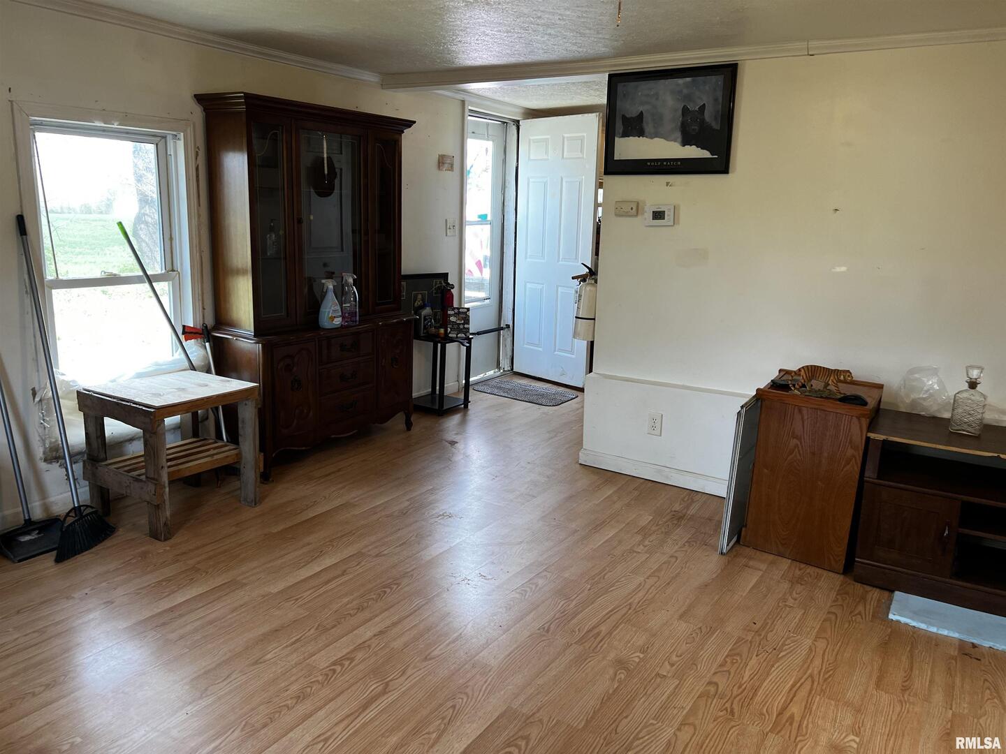 6846 East 1st Street Logan, IL 62856 - Photo 15 of 16 a view of a workspace with furniture and a window