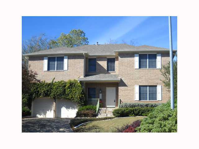 7000 Bending Oak Road Austin, TX 78749 - Photo 1 of 1 a view of a house with windows and yard