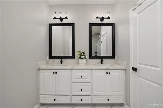 a bathroom with a shower and closet
