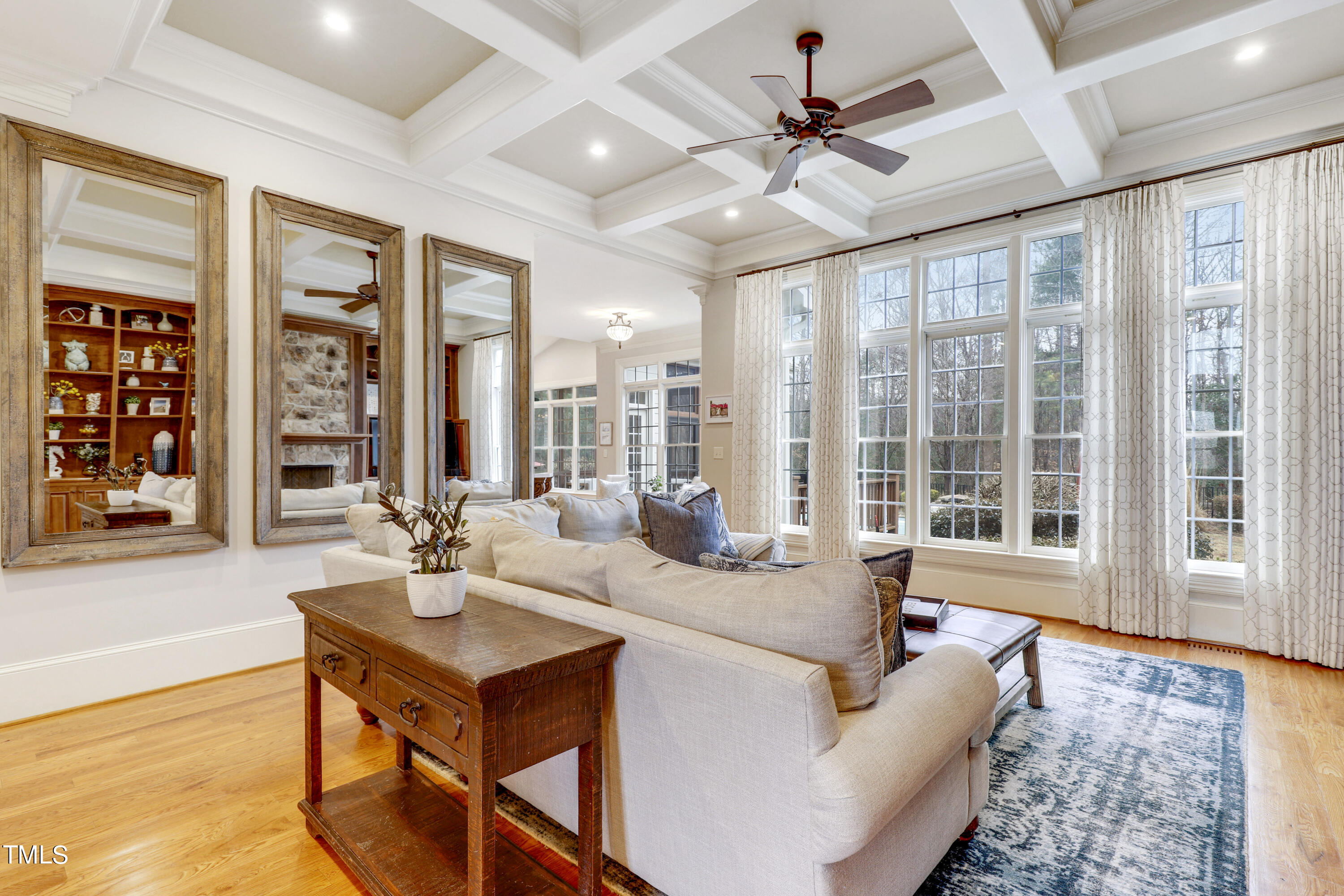 1204 High Glen Point Raleigh, NC 27614 - Photo 14 of 73 a living room with furniture a table and a large window