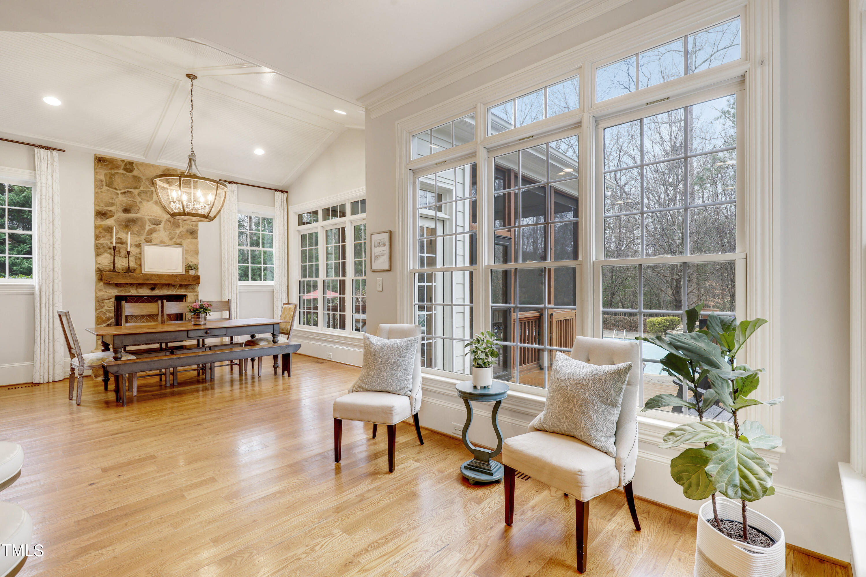 1204 High Glen Point Raleigh, NC 27614 - Photo 23 of 73 a living room with furniture and a floor to ceiling window
