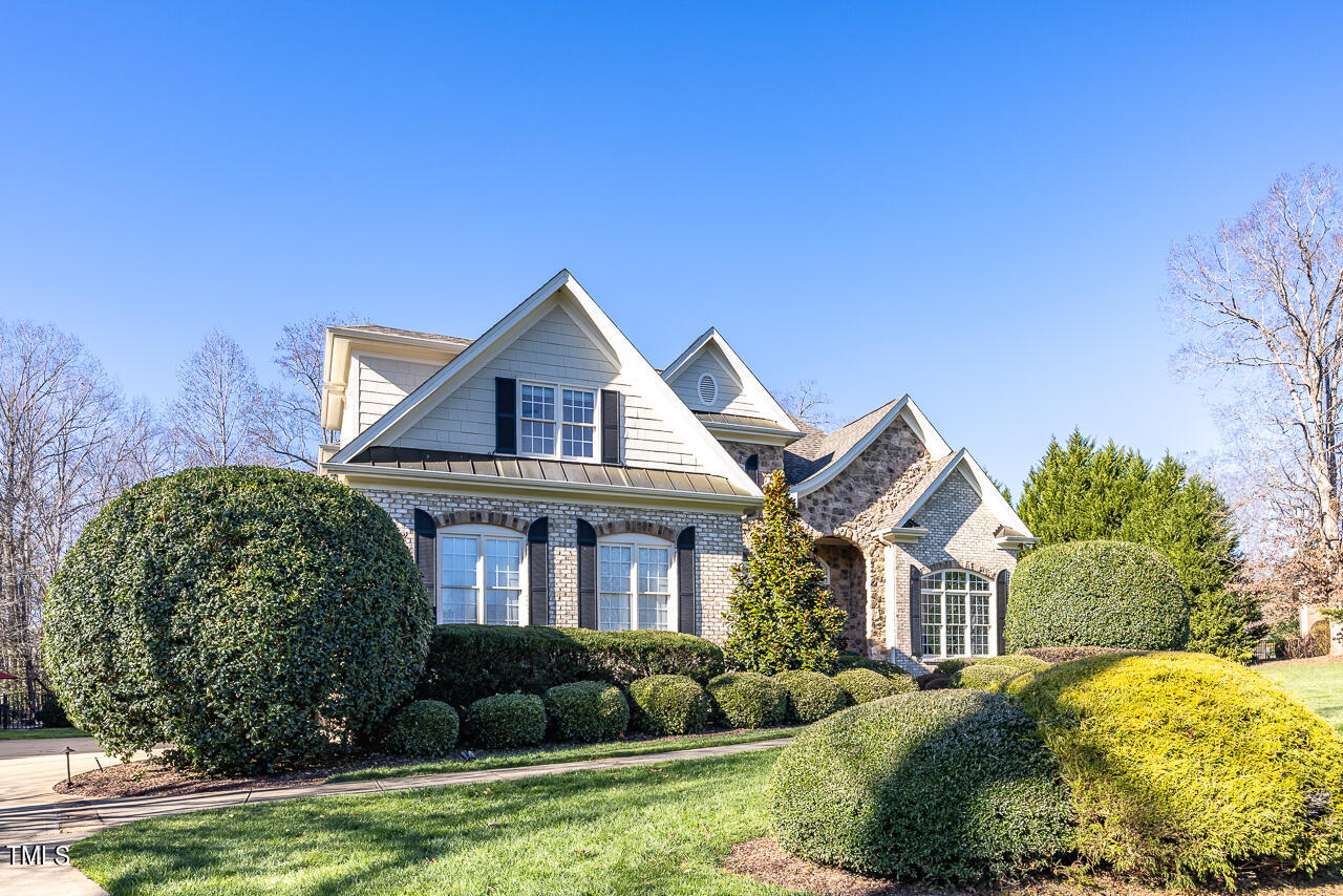 1204 High Glen Point Raleigh, NC 27614 - Photo 3 of 73 a front view of a house with a yard