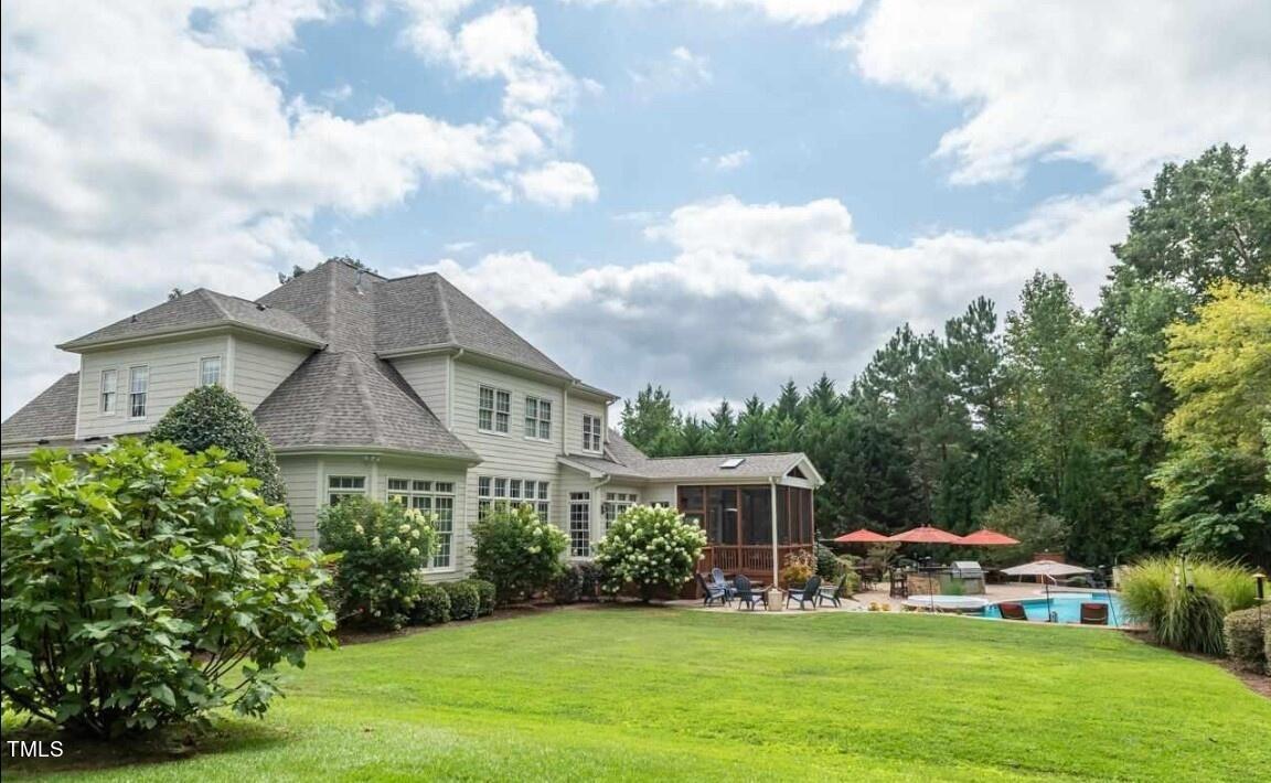 1204 High Glen Point Raleigh, NC 27614 - Photo 62 of 73 a front view of a house with garden