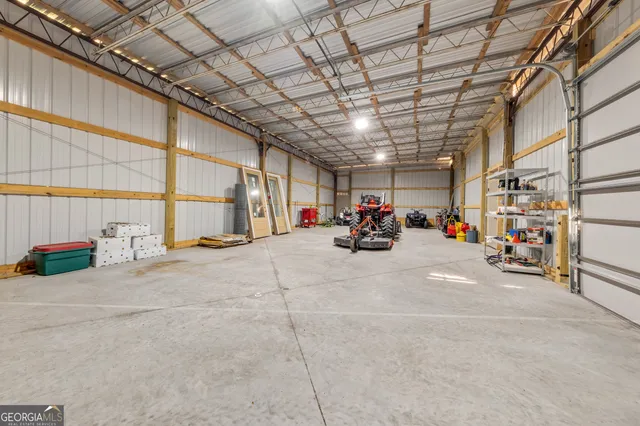 a aerial view of a house with a yard