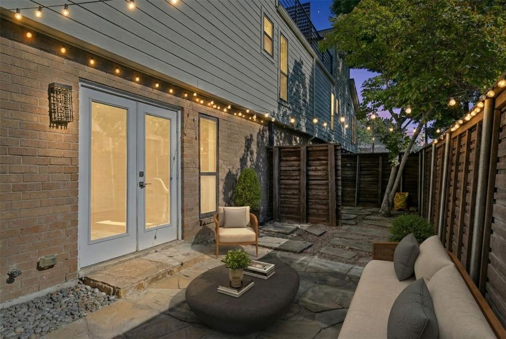 4102 Bowser Avenue, Unit 1 Dallas, TX 75219 - Photo 16 of 33 The private outdoor area extends entertaining space just off the living room through French doors