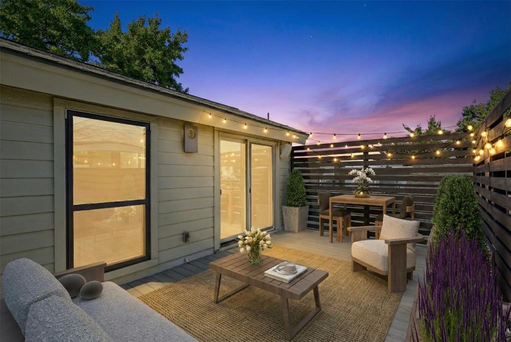 4102 Bowser Avenue, Unit 1 Dallas, TX 75219 - Photo 31 of 33 Private rooftop deck framed by slatted screens and string lights offers the perfect setting for sunset drinks and starlit evenings