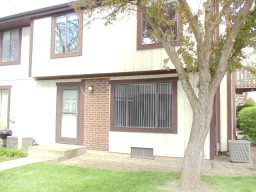 1732 Raintree Court, Unit 1732 Sycamore, IL 60178 - Photo 2 of 10 a house with trees in front of it