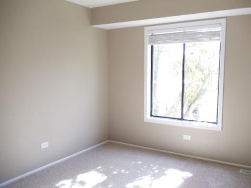 1732 Raintree Court, Unit 1732 Sycamore, IL 60178 - Photo 9 of 10 an empty room with a window