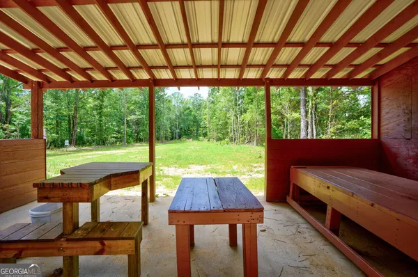 a sign of golf club on a wall