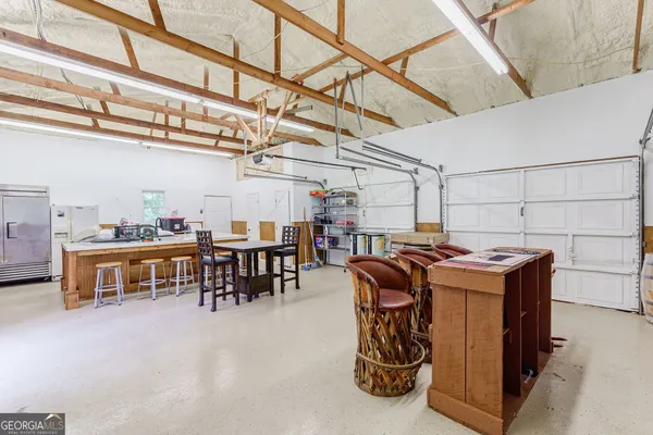 a bathroom with a sink toilet and mirror