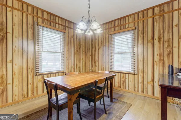 a view of a kitchen with microwave and a stove