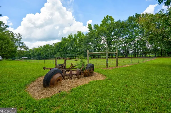 a view of a golf course with a lake