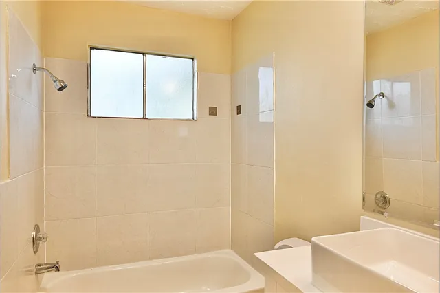 a bathroom with a sink and a bathtub