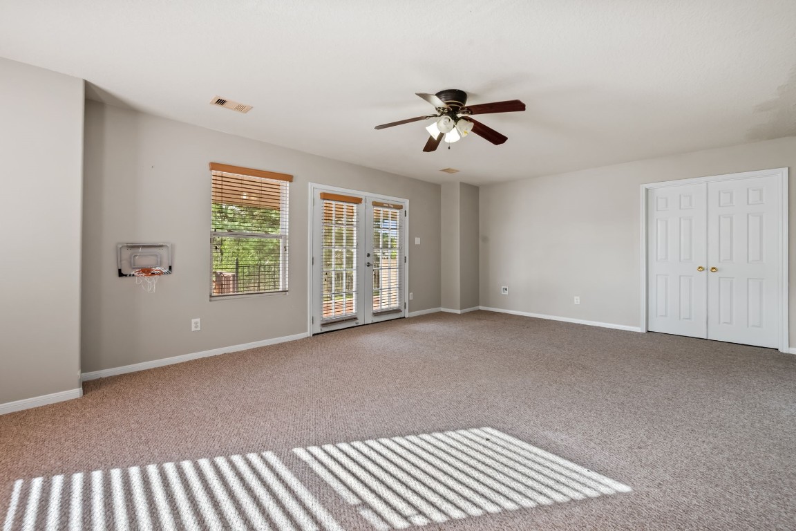 903 Northgate Springs Drive Spring, TX 77373 - Photo 22 of 30 Oversized Bedroom/Entertainment Room, with Huge Closet/Media Room through double doors!