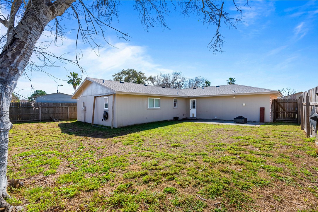 985 Ribbontail Street Corpus Christi, TX 78418 - Photo 15 of 15 a view of a house with a backyard